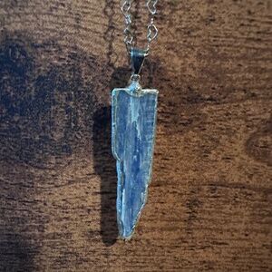 Black and blue kyanite pendants
